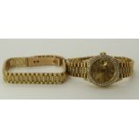 An 18ct yellow gold ladies diamond set Rolex Oyster DateJust, and matching bracelet watch with