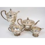 A four piece silver tea service by Lawson & Company, Glasgow 1919, of tapering circular form with