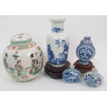 A Chinese blue and white baluster vase painted with a figure riding on an oxen with followers,