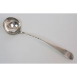 A George III silver ladle makers mark TS, Edinburgh 1795, approximately 5oz, 35cm long