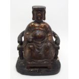 A Chinese gilt and lacquered figure of an official seated on a yolk back armchair and feet resting