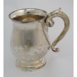 A Chinese silver tankard decorated with bamboo on a textured ground, scroll handle, stamped FJ,