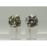 A pair of 9ct yellow gold diamond stud earrings of estimated approx 1ct combined diamond carat