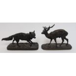 After Pierre-Jules MÈNE A bronzed metal figure of a fox on naturalistic base, 16cm long and