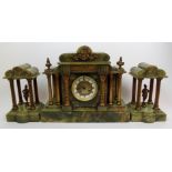 A French late 19th century green onyx clock garniture of classical palladian style with column