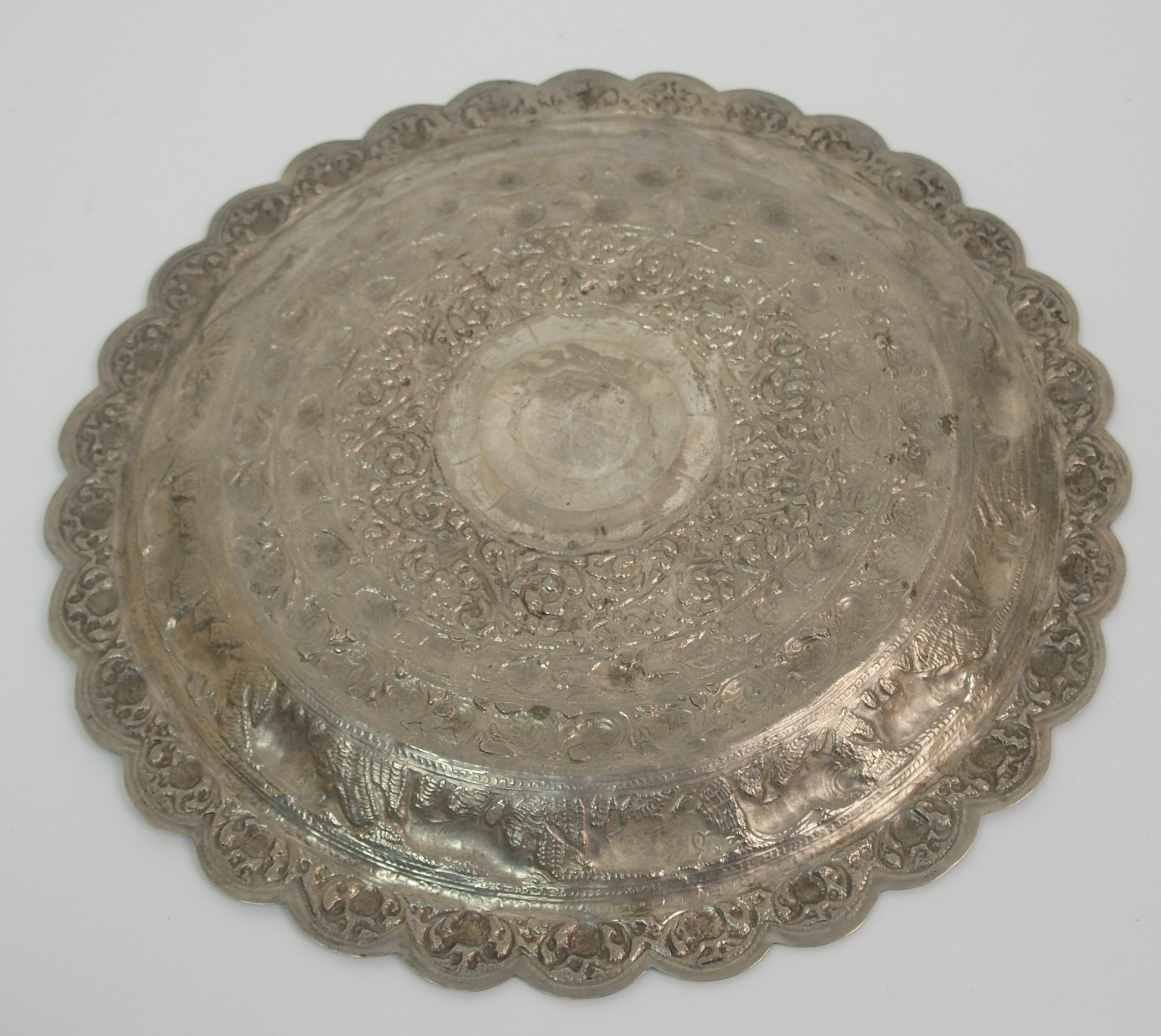 Nine Eastern white metal bowls 7.5 to 9.5cm diameter, a salver decorated with animals 26cm - Image 5 of 10