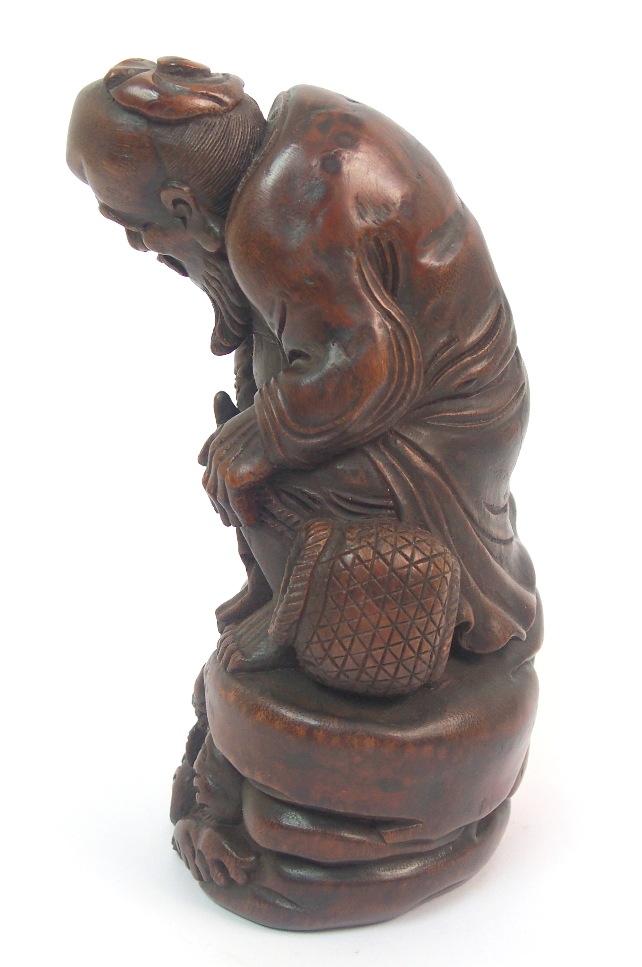 A Chinese bamboo figure of a fisherman seated on a rock above a young boy holding a fish amongst - Image 7 of 10