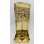 ALEXANDER RITCHIE of IONA (1856-1941) A Brass candle sconce circa 1920, the back plate repoussé
