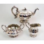 A William IV three piece silver tea service by William Marshall, Edinburgh 1836 (the cream jug