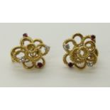 A pair of 18ct yellow gold, ruby and diamond retro earrings of circles design, with clip and post