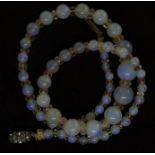 A string of opal beads interspaced with clear glass beads, largest opal bead approx 9.8mm smallest