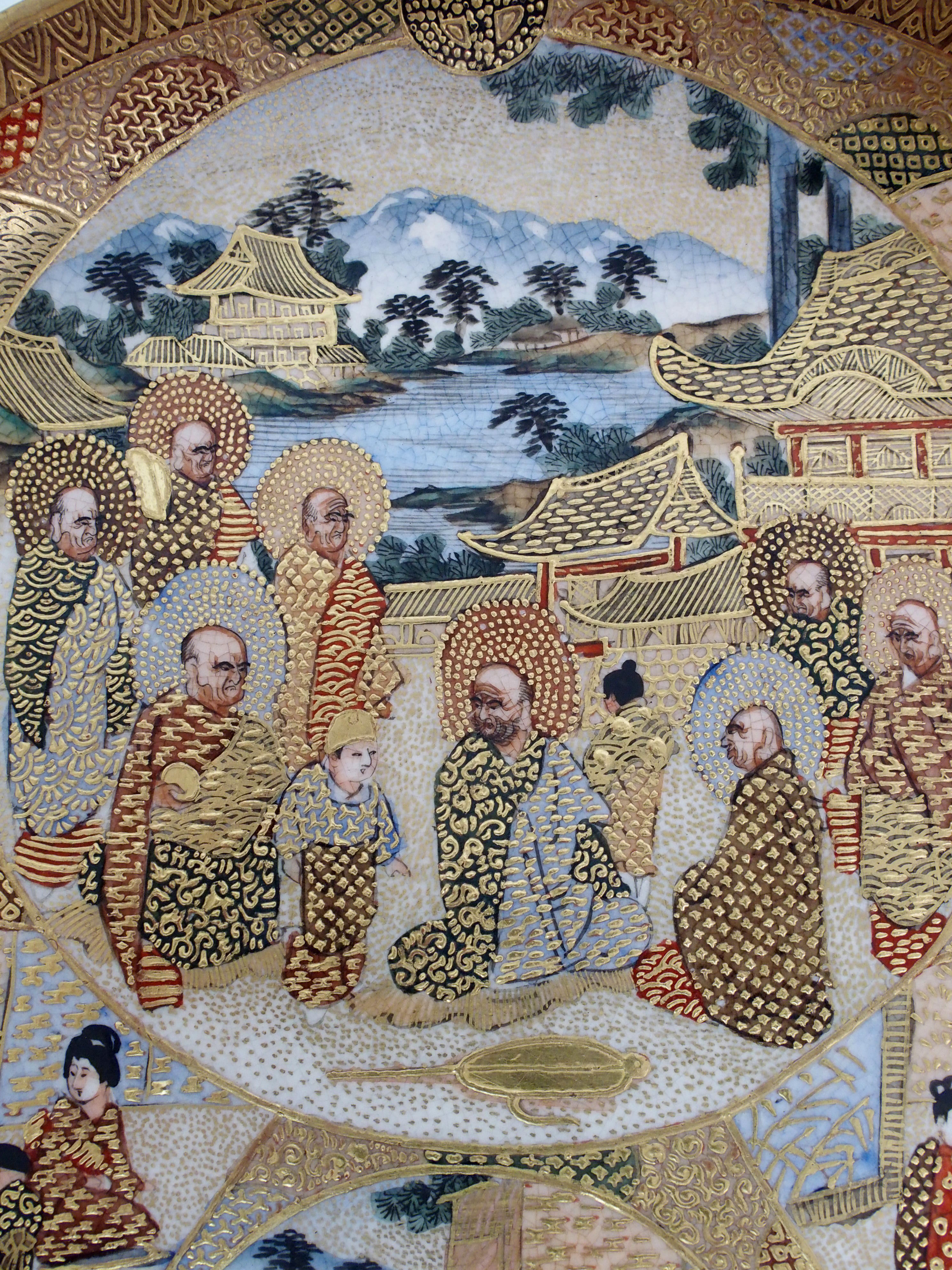 A Satsuma dish painted with Sennin and panels of figures within vignettes and amongst gilt diaper - Image 10 of 10