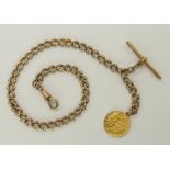 A 9ct gold fancy link albert chain with an attached Victorian 1887 half gold sovereign, hallmarked