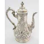 A Victorian silver coffee pot by James McKay, Edinburgh 1844, of baluster shape with foliate