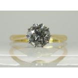 An 18ct yellow and white gold diamond solitaire of estimated approx 1.20cts in classic crown