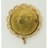 A George IV mounted £2 piece in a 9ct scrolled pendant mount, total weight 19.2gms