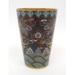 A Chinese cloisonne beaker decorated with two facing dragons divided by the flaming pearl, above