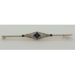 A French 18ct gold bar brooch set with old cut diamonds and synthetic sapphires, maker's mark ER