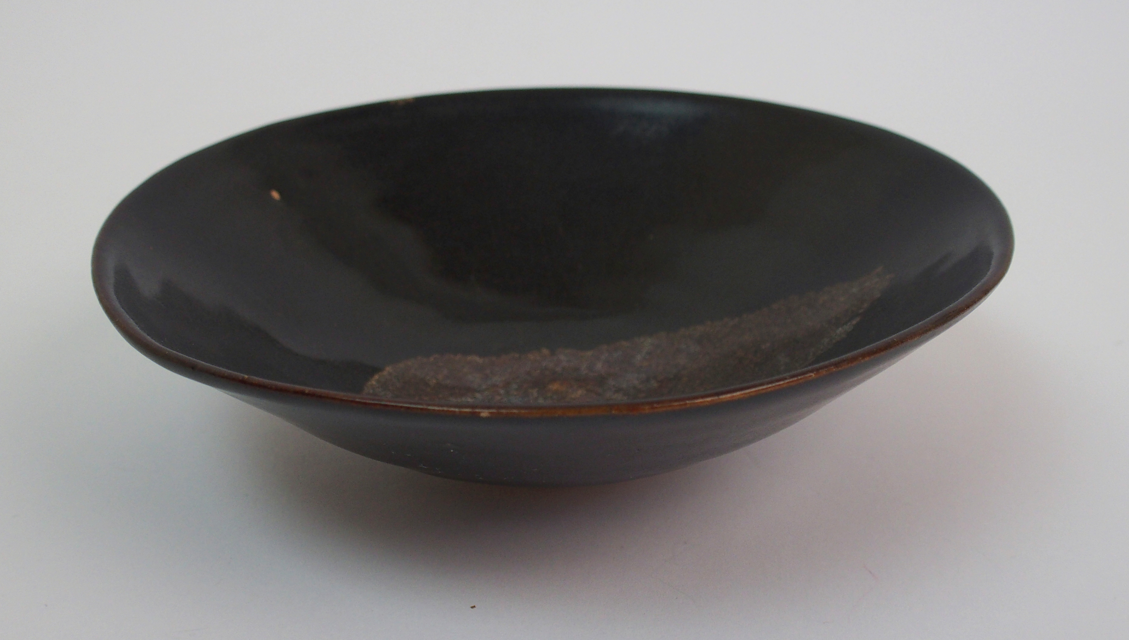 A Chinese black glazed bowl with single leaf decoration, 15.5cm diameter - Image 5 of 10