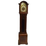 A mahogany longcase clock the brass face with silvered dial, Westminster and Whittington chimes,