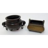A Chinese bronze censer the rectangular bulbous body with loop handles, cast seal mark, 11cm wide