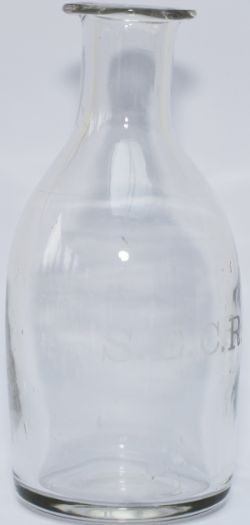 SECR glass wine carafe, SECR clearly etched on the side. Stands 7in tall and is in virtually mint