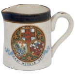 North Eastern Railway small china cream jug. Full colour Coat of Arms to side with N.E.RY HOTELS