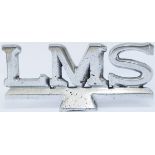 LMS cast and polished aluminium sign LMS as fitted to food/drink cabinets. In very good condition