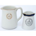 A pair of LMS cream jugs: one with full company crest to side, base marked MINTONS, stands 2in tall;
