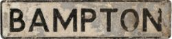 Cast aluminium road sign BAMPTON (DEVON). In original as removed condition measuring 44in x 10in.