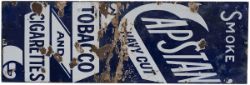 Advertising enamel sign SMOKE CAPSTAN NAVY CUT TOBACCO AND CIGARETTES. Measures 36in x 12in and