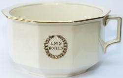 LMS china chamber pot with LMS HOTELS surrounded by the laurel leaf in gilt to the front and base