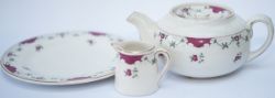 A selection of LMS Royal Scot Rose pattern china items to include: a teapot base marked GRINDLEY