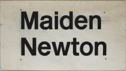 BR station sign MAIDEN NEWTON, black on white screen printed aluminium, measuring 38in x 21in. In