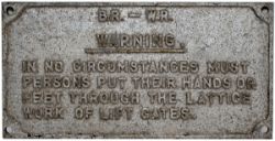 BR(W) cast aluminium notice BR-WR WARNING IN NO CIRCUMSTANCES MUST PERSONS PUT THEIR HANDS OR FEET