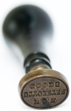 North Staffs Railway brass station stamp NSR UTTOXETER GOODS with an ebony handle. In excellent