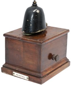Sykes small mahogany cased split case block bell, traffolite plate on the front MID KENT BELL and