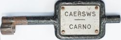 Tyers No9 single line steel key token CAERSWS-CARNO configuration B. In good condition.