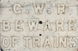 GWR wooden sign with cast iron letters G.W.R BEWARE OF TRAINS. An unusual sign, measures 29in x