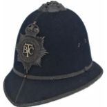 British Transport Policeman's helmet complete with original blackened BTC police helmet badge. In