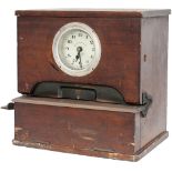 Mahogany cased clocking-in clock manufactured by the National Time Recorder Co Ltd Aquinas Street