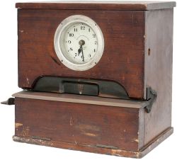 Mahogany cased clocking-in clock manufactured by the National Time Recorder Co Ltd Aquinas Street