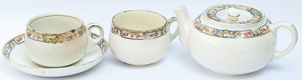 LNER Kesick Ware china teapot, 2 teacups and a saucer. Teapot base marked KESICK LNER 1933 ALFRED