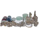 A box of lamp spares to include: x10 reservoirs, x20 burners, x20 various curved coloured glasses,