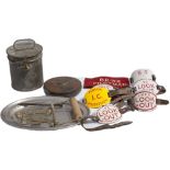 A selection of items to include: x6 enamel armbands (x1 LNER), a leather cased GWR tape measure, LMS