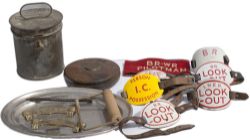 A selection of items to include: x6 enamel armbands (x1 LNER), a leather cased GWR tape measure, LMS