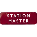 BR(M) enamel doorplate STATION MASTER measuring 18in x 6in. In good condition with a couple of small