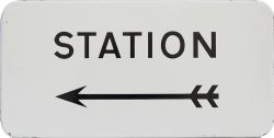 BR enamel direction sign STATION with left facing arrow measuring 21in x 10in. Black on white enamel