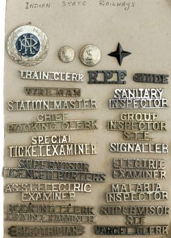 A large selection of INDIAN STATE RAILWAYS cap badges to include; Station Master, Train Examiner,