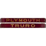 GWR/BR-W wooden carriage board PLYMOUTH - TRURO painted straw on maroon and measuring 32in long.